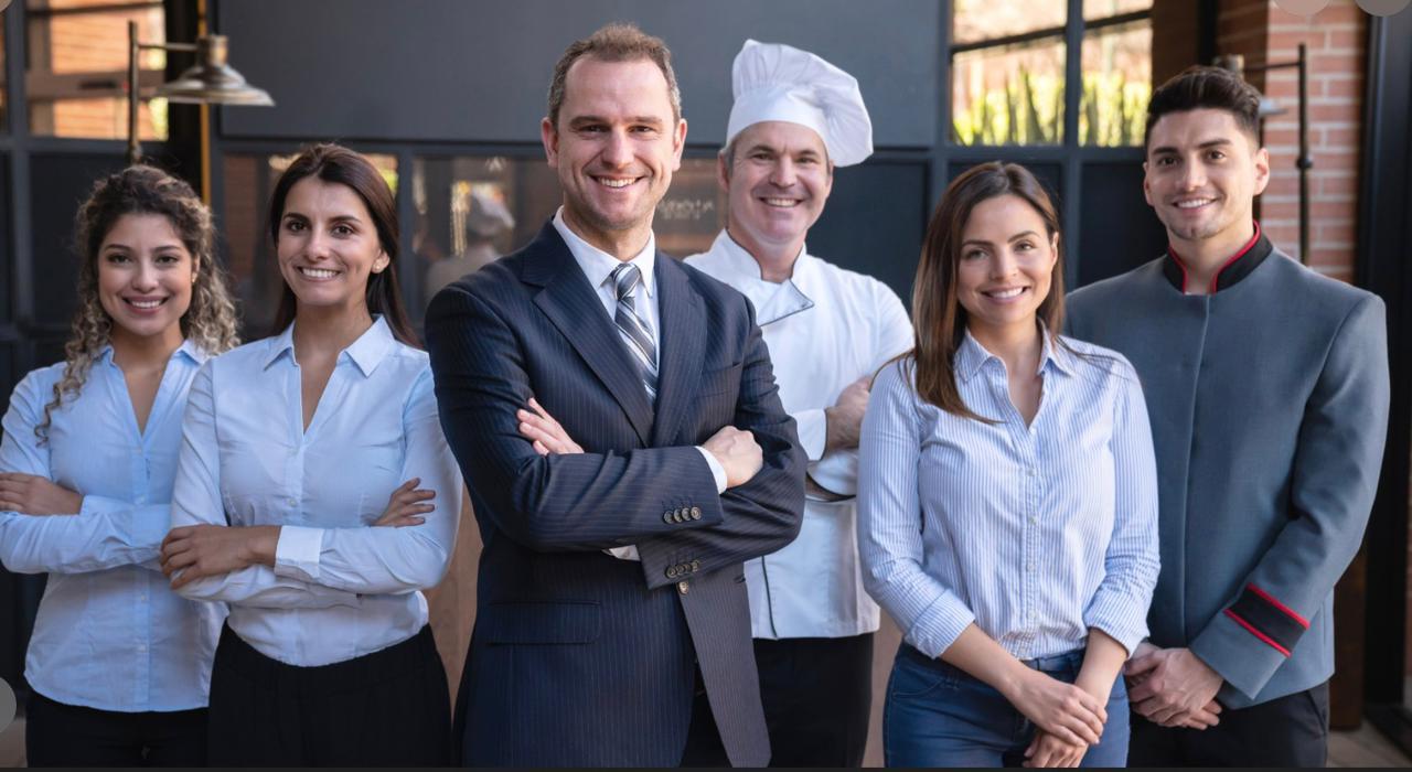 Proud hospitality candidates and staff team